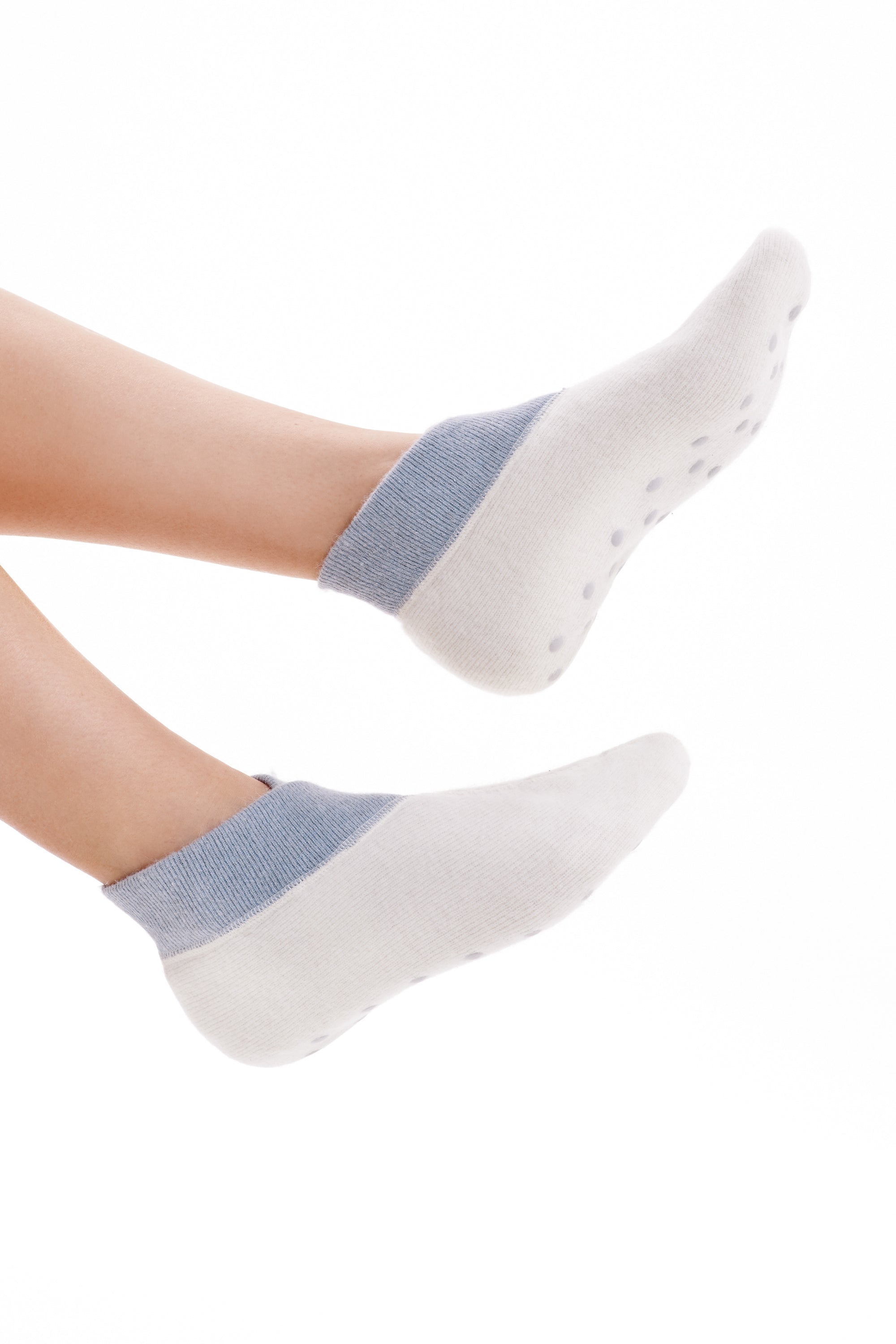 Fußwärmer - extra weitem Bündchen aus Angora für wohlig warme Füße.