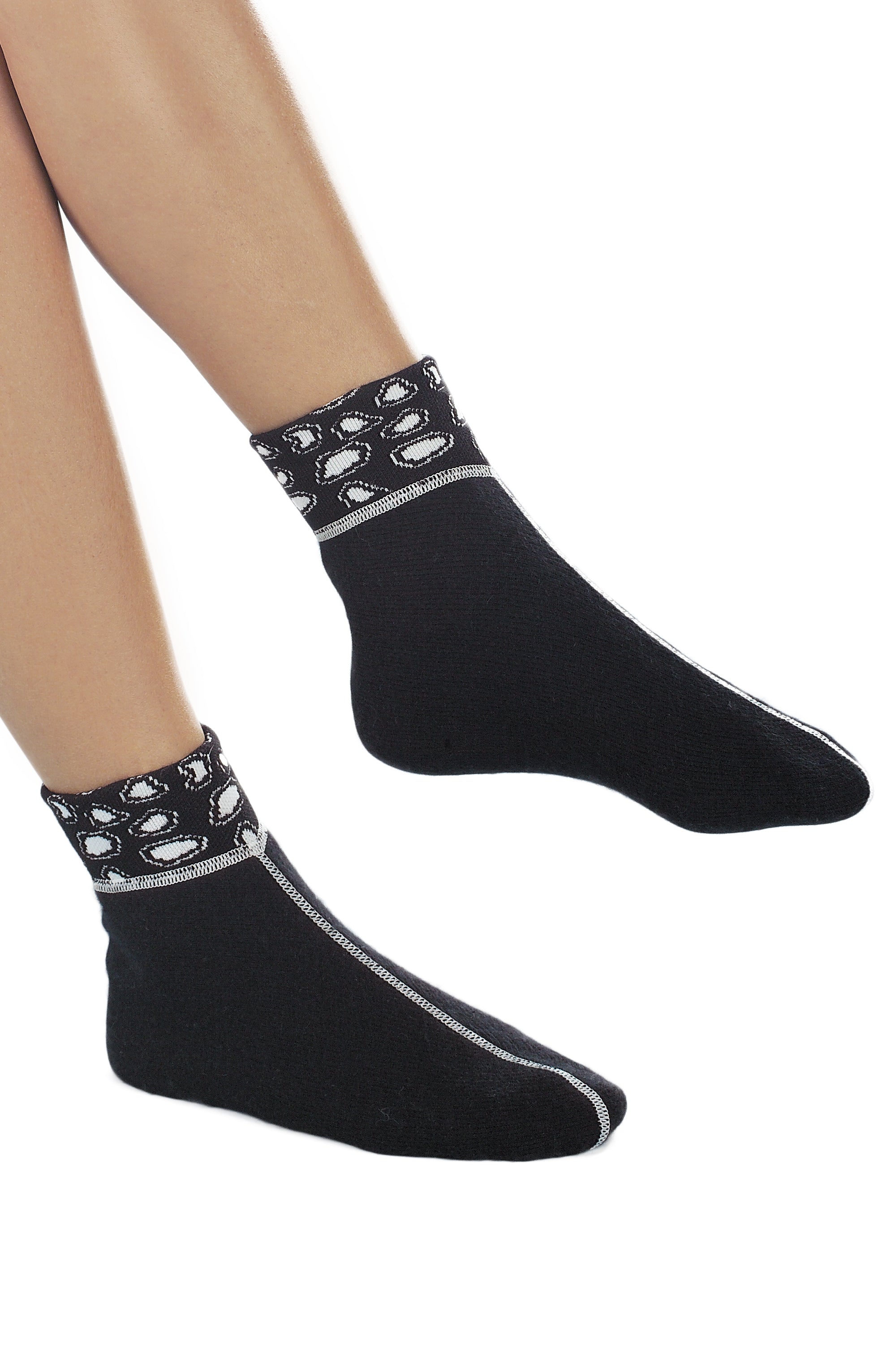 Bettdinger - Bettschuhe aus Angorawolle für warme, gemütliche Füße.